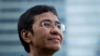 File - Filipino journalist Maria Ressa, one of 2021 Nobel Peace Prize winners, poses for a portrait in Taguig, Philippines, October 9, 2021.