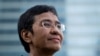 FILE - Filipino journalist and Rappler CEO Maria Ressa, one of 2021 Nobel Peace Prize winners, poses for a portrait in Taguig City, Metro Manila, Philippines, October 9, 2021. 