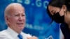 President Joe Biden gets his COVID-19 booster from a White House medical unit member in the South Court Auditorium on the White House campus in Washington, Oct. 25, 2022.