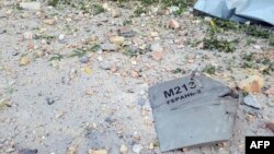 This handout photo taken and released by the Armed Forces of Ukraine purports to show pieces of Iranian-made kamikaze drone, said to have been shot down in Ukraine's southern port city of Odesa, Sept. 25, 2022.