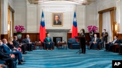 In this photo released by the Taiwan Presidential Office, Taiwanese President President Tsai Ing-wen speaks during a visit by French lawmakers led by French Senator Joel Guerriau at the Presidential Office in Taipei, Taiwan, June 9, 2022.