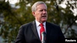 FILE - Then-White House chief of staff Mark Meadows speaks to reporters following a television interview, outside the White House in Washington, Oct. 21, 2020.