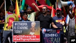 FILE - Members of the Tigrayan community protest against the conflict between Ethiopia and Tigray rebels in Ethiopia's Tigray region, outside the the United Arab Emirates embassy in Pretoria, South Africa, Oct. 12, 2022. 