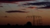 FILE - Power lines are seen at dawn, near Wernigerode, Saxony-Anhalt, Germany, Oct. 10, 2022.