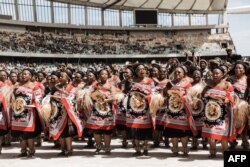 Women wearing traditional attire from Swaziland perform a dance at the King Misuzulu Zulu's coronation at the Moses Mabhida Stadium in Durban, Oct. 29, 2022.
