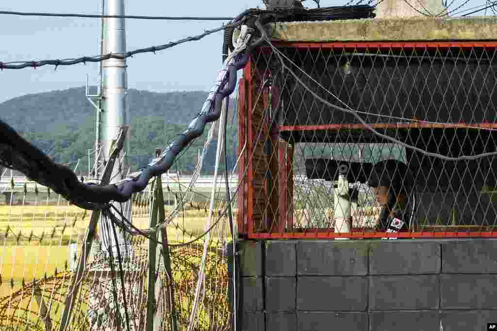 A South Korean army soldier stands guard inside a military guard post at the Imjingak Pavilion in Paju, South Korea, near the border with North Korea.