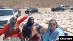 Zarghoona Wadood, far right, went sightseeing in Egypt last year with two fellow wheelchair-users. Polio paralyzed her legs when she was 7 months old. (Zarghoona Wadood)