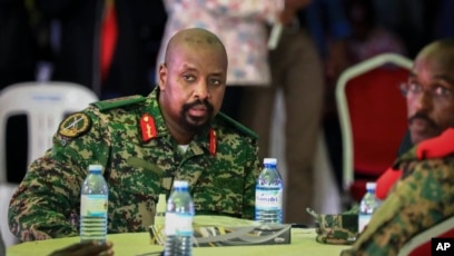 FILE - Then-Lt. Gen. Muhoozi Kainerugaba, son of Uganda's President Yoweri Museveni, attends a ceremony in Entebbe, Uganda, May 7, 2022.