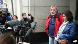 FILE - Dmitry Muratov, editor of the Russian newspaper Novaya Gazeta, speaks to reporters after a hearing in the Supreme Court of the Russian Federation in Moscow, Sept. 15, 2022. The court shut the website of Novaya Gazeta, which had been sharply critical of the Kremlin.