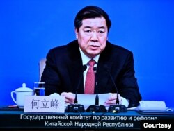 FILE - He Lifen, chairman of China's National Development and Reform Commission, virtually attends the signing of a railway memorandum with Uzbekistan and Kyrgyzstan, on Sept. 14, 2022. (president.kg)