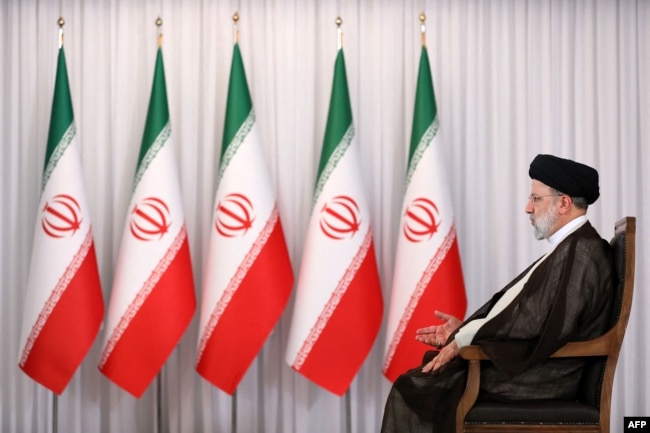 A handout picture provided by the Iranian presidency shows Iran's President Ebrahim Raisi speaking during a televised interview in the capital Tehran, Sept. 28, 2022.