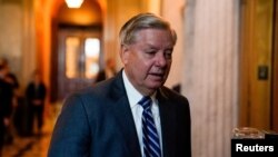 FILE -- U.S. Senator Lindsey Graham arrives to attend the Senate Republicans weekly policy lunch at the U.S. Capitol in Washington, Sept. 7, 2022.