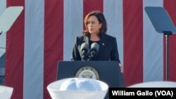 U.S. Vice President Kamala Harris delivers a speech to U.S. sailors aboard the USS Howard naval destroyer at Yokosuka Naval Base outside Tokyo, Japan, Sept. 28, 2022.