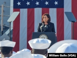 U.S. Vice President Kamala Harris delivers a speech to U.S. sailors aboard the USS Howard naval destroyer at Yokosuka Naval Base outside Tokyo, Japan, Sept. 28, 2022.