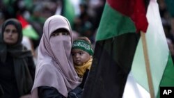 Supporters of the Palestinian Hamas movement attend a rally in support of Jerusalem's al-Aqsa mosque, in Gaza City, Oct. 1, 2022.