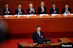 FILE - Chinese President Xi Jinping speaks at the opening ceremony of the 20th National Congress of the Communist Party of China, at the Great Hall of the People in Beijing, China, Oct. 16, 2022.
