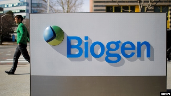 FILE PHOTO: A sign marks a Biogen facility in the city of Cambridge in the U.S. state of Massachusetts, March 9, 2020.