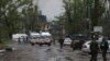 FILE - Red Cross vehicles are seen in Mariupol, in Ukraine's now Russia-annexed Donetsk region, May 18, 2022.