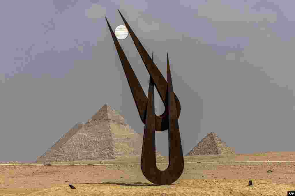 A view of the sculpture &quot;Spirit of Hathor&quot; by British-American sculptor, collector, art advisor, educator, and author Natalie Clark at the Giza pyramids necropolis during the second edition of the Art DÉgypte exhibition &quot;Forever is Now&quot;.