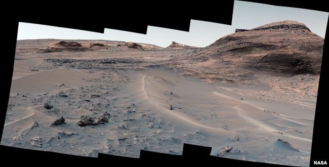 NASA’s Curiosity Mars rover used its Mast Camera, or Mastcam, to capture this panorama of a hill nicknamed "Bolivar" and adjacent sand ridges on Aug. 23, the 3,572nd Martian day, or sol, of the mission. (Credits: NASA/JPL-Caltech/MSSS)