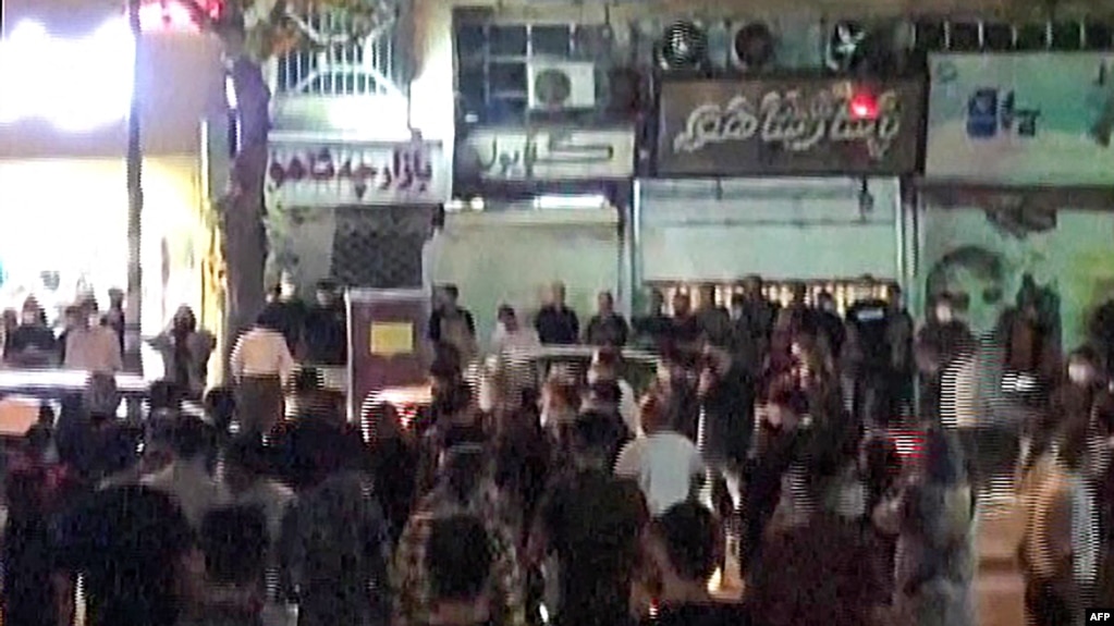 Protesters take to the streets of Sanandaj, the capital of Iran's Kurdistan province, Sept. 28, 2022, as demonstrations continue to spread nearly two weeks after the death of Mahsa Amini in custody, in this screen grab taken from a UGC video.