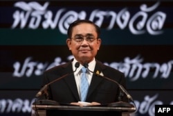 FILE - Thailand's Prime Minister Prayut Chan-ocha addresses an award function in Bangkok, Aug. 17, 2022.