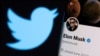 FILE - Elon Musk's twitter account is seen on a smartphone in front of the Twitter logo in this photo illustration taken, April 15, 2022. (REUTERS/Dado Ruvic/Illustration)