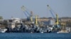 FILE - Russian Black Sea fleet ships are seen in one of the bays of Sevastopol, in Russia-annexed Crimea, March 31, 2014. On Oct. 29, 2022, at two Russian ships in Sevastopol's port suffered damage in an attack Russia is using to justify its suspension of the grain export deal.