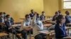 FILE - Students sit socially distanced in class as they attend a lesson at the Ethio Parents elementary and high school in Addis Ababa, Ethiopia, October 26, 2020.