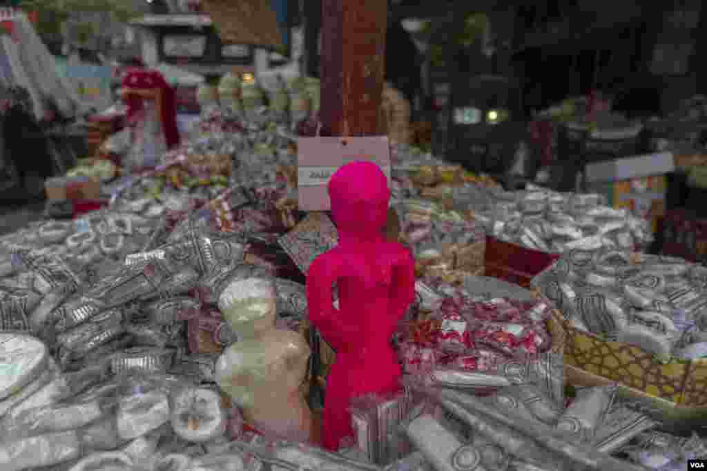 These sugary holiday treats, often shaped like dolls or horses, are popular gifts for children in Cairo, Oct. 8, 2022. (Hamada Elrasam/VOA) 