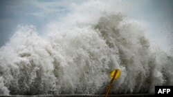Waves hit the Malecon in Havana, after the passage of Hurricane Ian. 