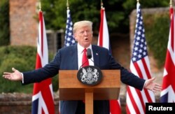 U.S. President Donald Trump speaks as he and British Prime Minister Theresa May hold a press conference after their meeting at Chequers in Buckinghamshire, Britain July 13, 2018.