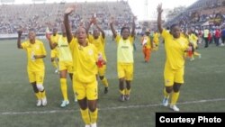 The Mighty Warriors celebrating after beating the Indomitable Lionesses of Cameroon. (Photo: ZIFA website)