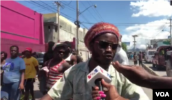 Rapper 222 Flow says the neighborhood is thrilled to have Pascal Alexandre back home. (Matiado Vilme /VOA Créole)