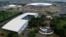 An aerial view of the Mane Garrincha National Stadium (R) and the Convention Center Ulysses Guimaraes in Brasilia, Brazil, Jan. 20, 2014.