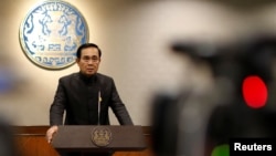FILE - Thai Prime Minister Prayuth Chan-ocha speaks at a news conference in Bangkok, Thailand, May 23, 2017. 