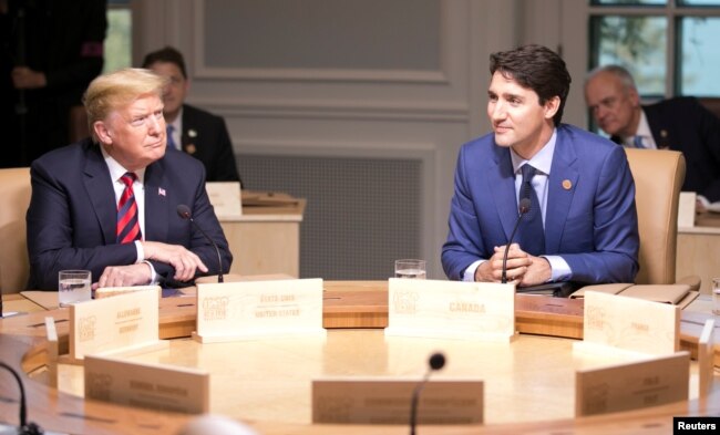 Джастин Трюдо и Дональд Трамп на саммите G-7, Квебек, Канада, 8 июня 2018