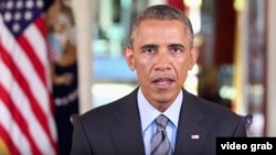 FILE - In this screen grab taken from video President Barack Obama is seen delivering his weekly Saturday address, Dec. 5, 2015.