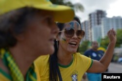 A supporter of presidential candidate Jair Bolsonaro reacts during a pro-Bolsonaro demonstration in Rio de Janeiro, Brazil, Sept. 29, 2018.