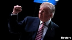 Republican U.S. presidential nominee Donald Trump appears at a campaign rally in Florida, Oct. 11, 2016. 