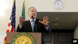 Washington Gov. Jay Inslee speaks to a meeting of the STEM Education Innovation Alliance, Feb. 27, 2019, at the Capitol in Olympia, Wash.