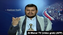 Yemeni Shi'ite Houthi movement leader Abdel-Malek al-Houthi, whose fighters seized the presidential palace, delivers a televised statement from an undisclosed location in the Saada governorate, northwest Yemen, Jan. 20, 2015.