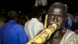 Sudanese protesters take to the streets in the capital Khartoum durning a demonstration demanding the dissolution of the transitional government on Oct.18, 2021.