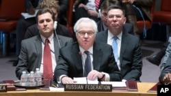 FILE - Russia's U.N. Ambassador Vitaly Churkin speaks during an U.N. Security Council meeting, March 15, 2014, at United Nations headquarters.