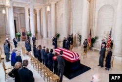 hief Justice of the US Supreme Court, John Roberts, speaks during a private ceremony for Justice Ruth Bader Ginsburg at the Supreme Court in Washington, DC, on September 23, 2020.