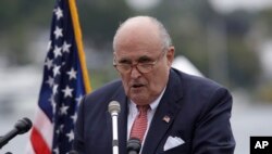 Rudy Giuliani, pengacara Presiden Trump, di New Hampshire, Portsmouth, N.H., 1 Agustus 2018. (AP/Charles Krupa)