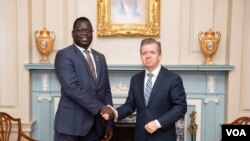 Phillip Jada Natana, South Sudan’s new ambassador to the United States, meets with the Chief of the Protocol of the United States Ambassador Sean P. Lawler (right) at the State Department in Washington. (State Department photo)