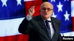FILE - Rudy Giuliani speaks at the 2018 Iran Freedom Convention in Washington, May 5, 2018. 