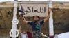 لیبیا: بنی ولید میں لڑائی جاری، قذافی کا بیٹا نائیجرفرار