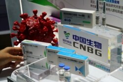 A display of a coronavirus vaccine candidate from Sinopharm is seen at the 2020 China International Fair for Trade in Services in Beijing, China September 4, 2020. (REUTERS/Tingshu Wang)
